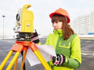 ALTA title survey fieldwork using survey equipment to document a developed commercial property in Fairfax Virginia.