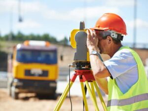 Land surveyor confirming property information before permit applications in Fairfax Virginia